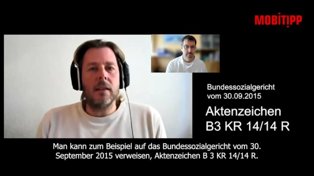 Screenshot eines Mannes mit Headset beim Interview