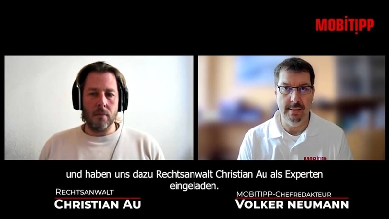 Screenshot von zwei Männern im Online-Interview