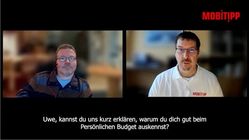 Screenshot von zwei Männern in einer Videokonferenz